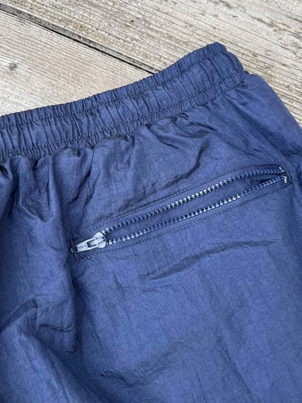 Pro Celebrity navy blue windbreaker track pants
